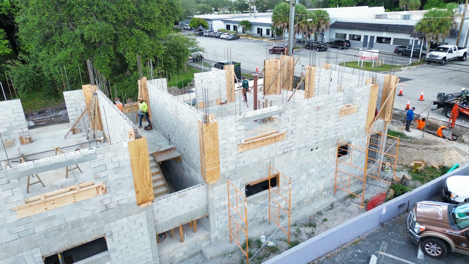 Arkham Apartments walls rising, August 2025 — Brunt & Company
